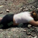 Hallan a mujer muerta a balazos en camino de terracería en Zihuatanejo