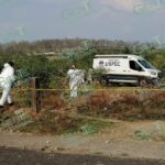 Localizan cadáver de un hombre, envuelto en costales de yute