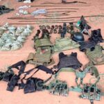 Sedena asegura en Coalcomán armas, equipo táctico droga y vehículos